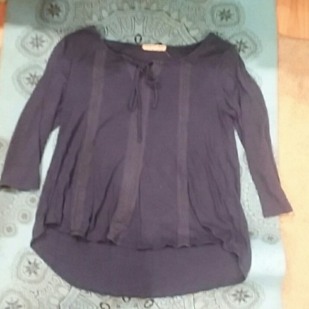 A woman's medium sleeved shirt
